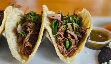EL Rincon Mexican Kitchen and Tequila Bar signature dishes Torta El Chavo
Nachos Locos
Papo's Brisket Tacos
